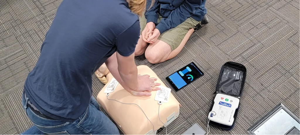 image of students at evolution practicing CPR skills
