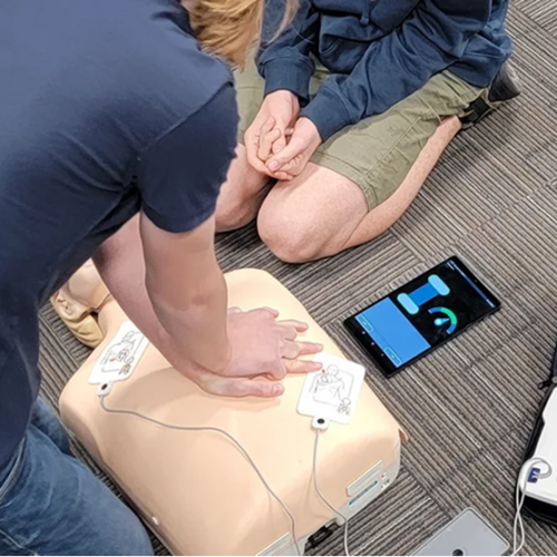 cpr-at-evolution image of students at evolution practicing CPR skills