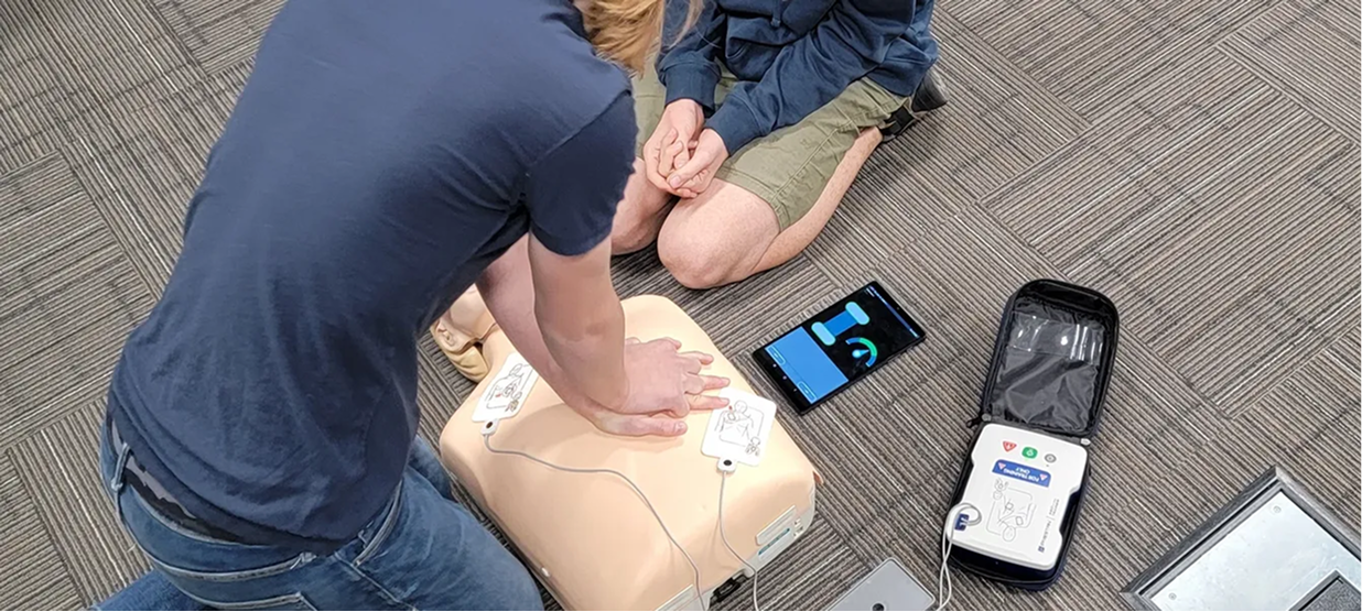 image of students at evolution practicing CPR skills