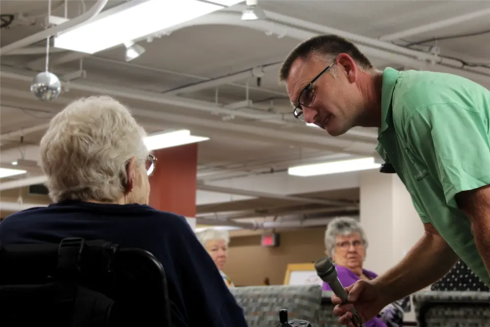 Darrell asking a Seniors Safe attendee a question