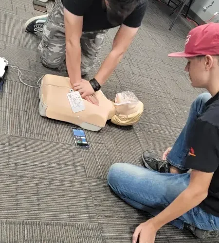 evolution-first-aid-33 Students learning C